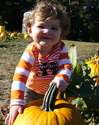 Ah, at last!  This is the perfect pumpkin in a photo you'll always cherish-from Educational School Tours at Motley's Pumpkin Patch and Christmas Trees, Little Rock, Arkansas.